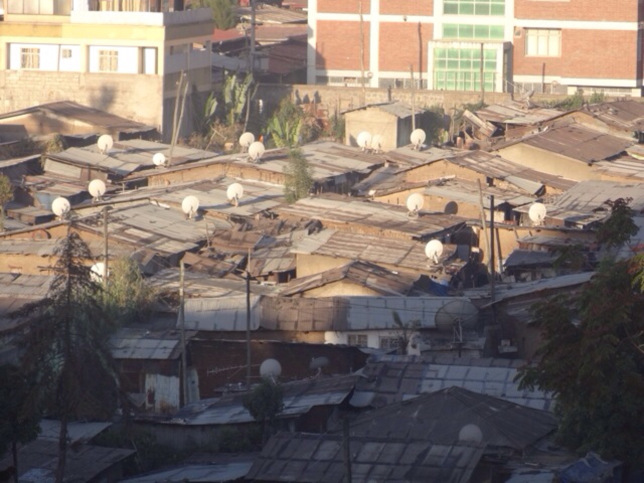 Satellite Dishes in the Slums