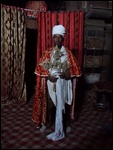 The Priest With Processional Cross
